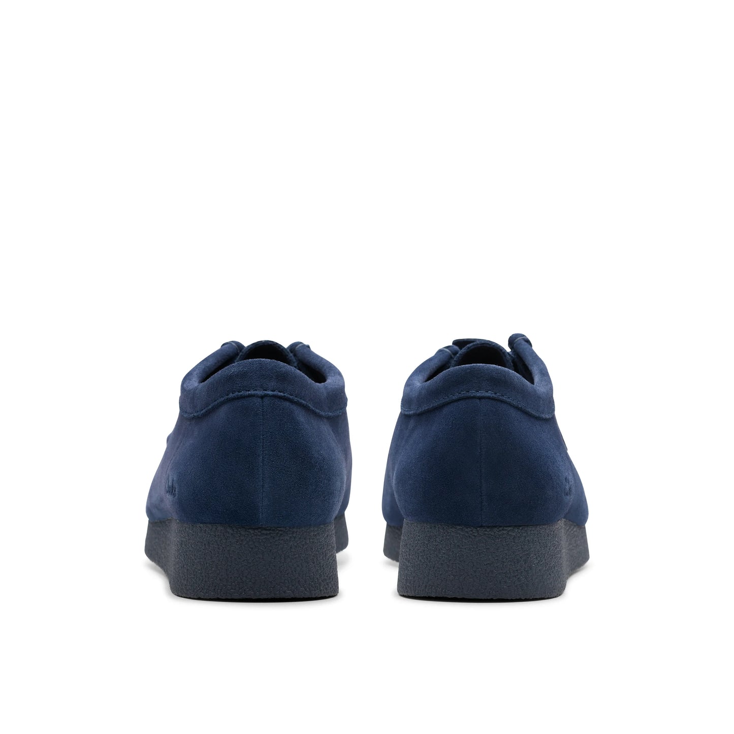 Chaussures décontractées pour femmes Clarks, modèle Wallabeeevosh en daim bleu marine, en bleu.