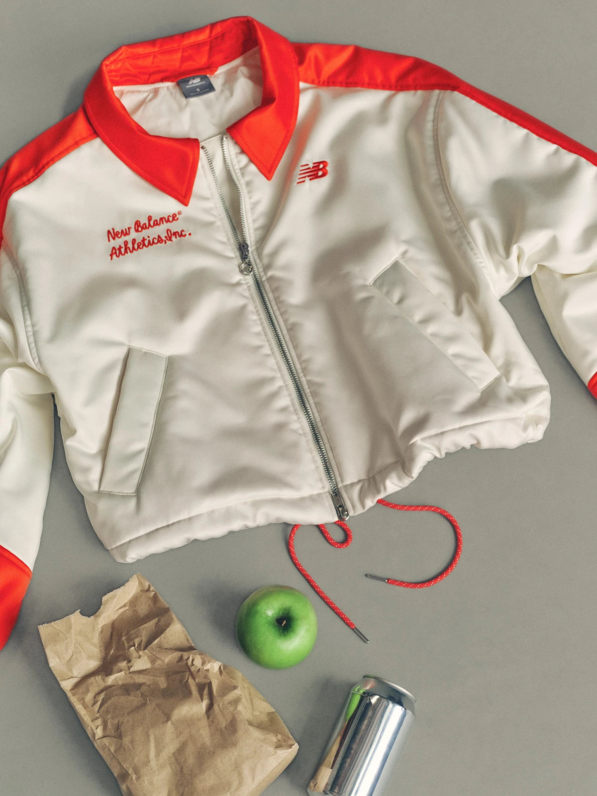 NEW BALANCE | CHAQUETAS | MUJER | SPORT LEGACY STADIUM JACKET ANGORA | BEIGE