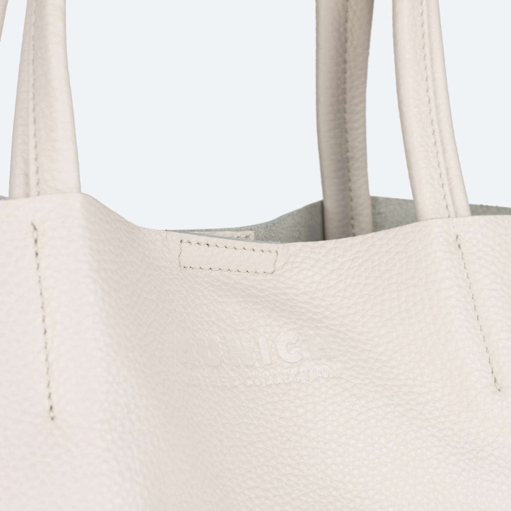 Borsa unisex del marchio Munich, modello Loft Woman Shopper Cream, di colore bianco.