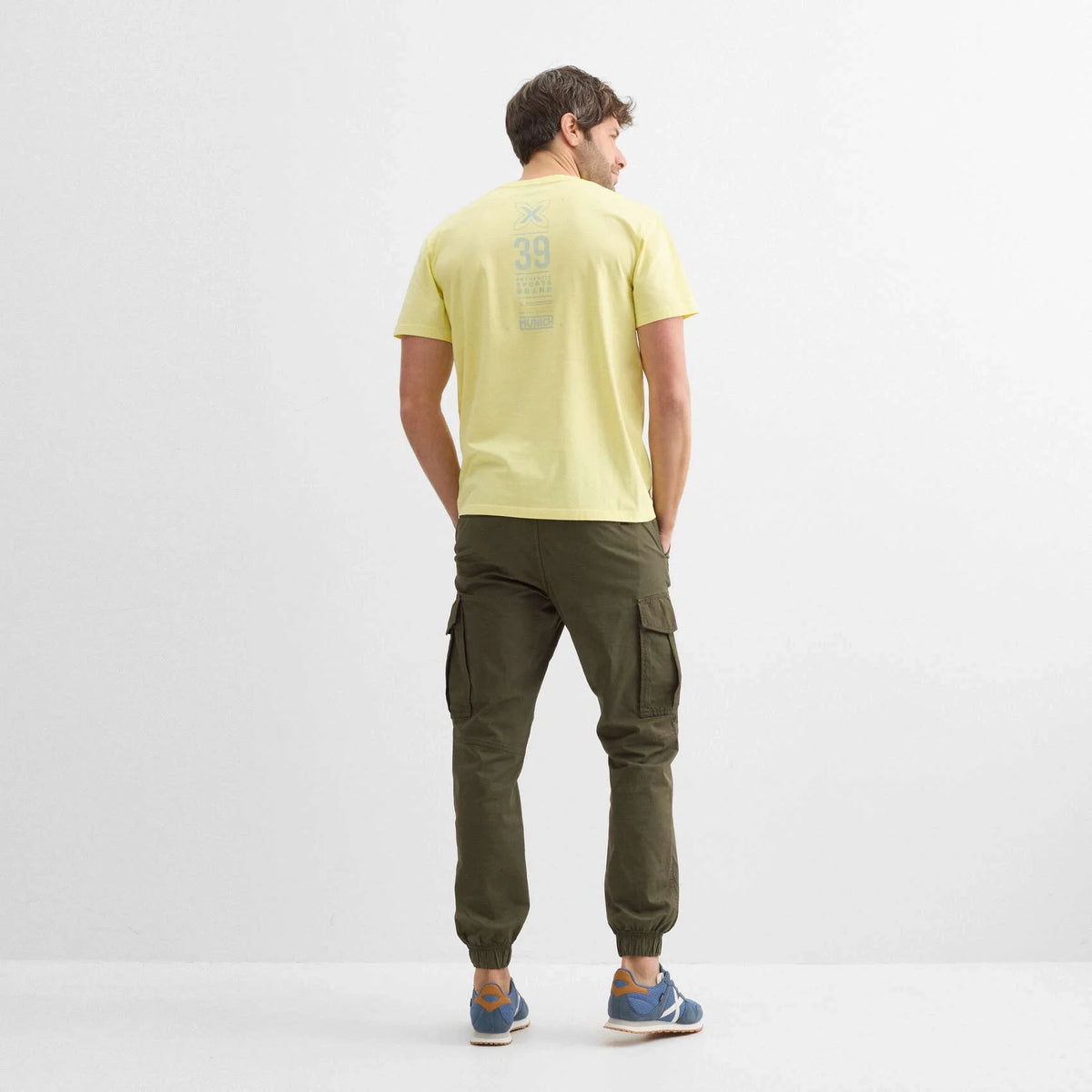 MUNICH Regular T-shirt Heritage Lifestyle Yellow E, neutro obuwie unisex w Tascón