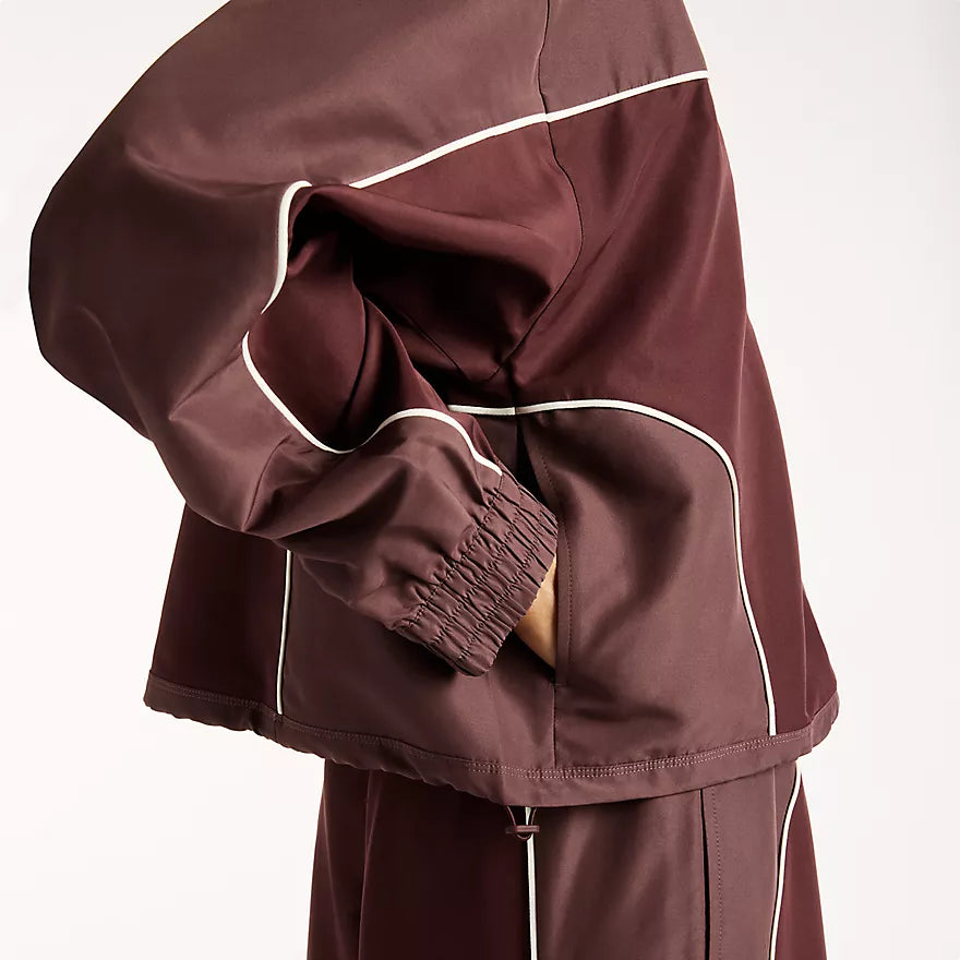 NEW BALANCE Trackside Woven Jacket Cherry Leather: レッド ジャケット レディース